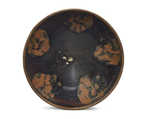 A Chinese Henan russet-splashed black-glazed tea bowl20th centuryCovered overall in a black glaze with five russet splashes t