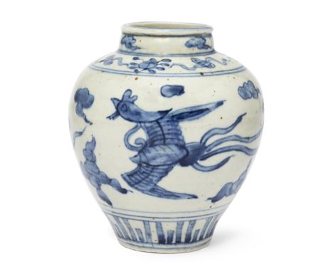 A small Chinese blue and white 'phoenix' baluster vaseLate Ming dynasty, 17th centuryBoldly painted on the baluster body with