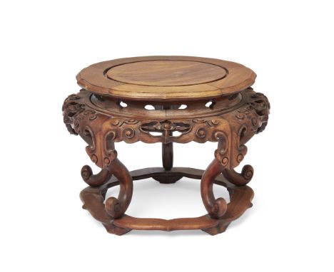 A large Chinese huanghuali vase stand20th centuryWith carved and pierced frieze decorated with flower heads, ruyi heads, and 