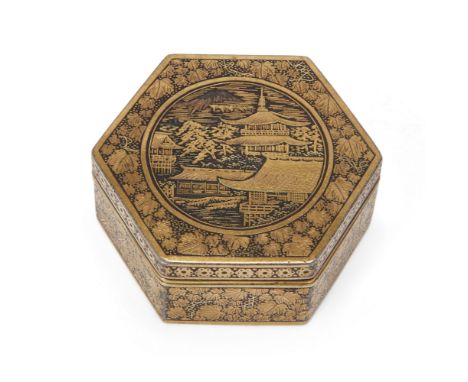 A Japanese Komai-style maki-e damascene iron hexagonal box and hinged coverMeiji periodThe black iron overlaid in gold with a
