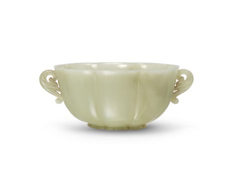 A Chinese Mughal-style pale celadon jade lobed twin-handled bowlQing dynasty, 17th/18th centuryOf oval lobed form with carved