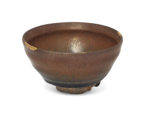 A Chinese Jian ware 'hares' fur' tea bowlSouthern Song dynastyCovered overall with a blackish-brown glaze finely streaked wit