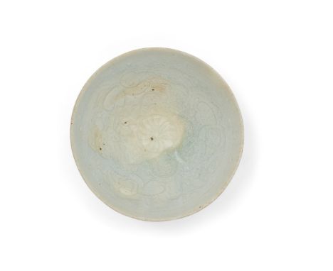 A Chinese qingbai-glazed carved 'boys' bowl20th century With incised design of boys to the interior, the exterior carved with