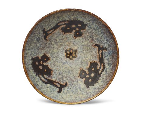 A Chinese Jizhou-type paper-cut 'phoenix and prunus' tea bowl20th centuryThe interior resist-decorated with three stylised ph