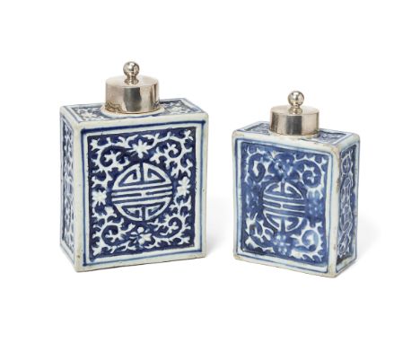 Two Chinese blue and white tea caddiesQing Dynasty, 18th centuryEach of flattened form, similarly moulded with a shou charact