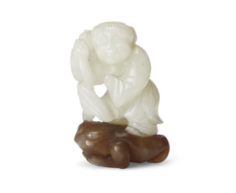 A Chinese white and brown jade two-tone carving of Liu Hai Qing dynasty, 18th/19th centuryThe two tones of the stone cleverly