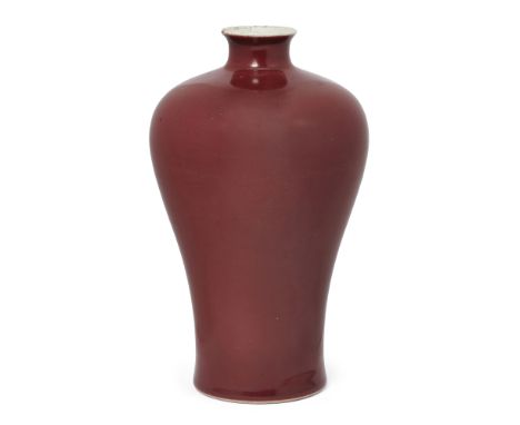The Robert G. Vater CollectionA Chinese copper-red glazed baluster vase, meipingQing dynasty, 18th centuryRising from a narro