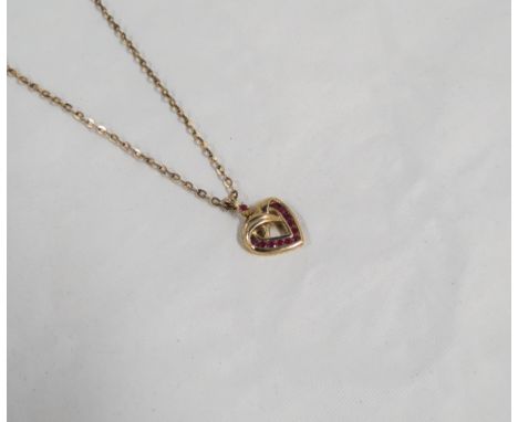 9CT GOLD RUBY PENDANT ON 9CT GOLD CHAIN