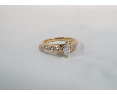 14CT GOLD MARQUISE 9 STONE RING WITH HALF CARAT OF DIAMONDS