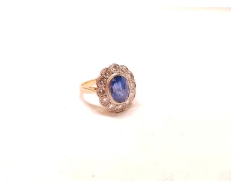 STUNNING 18 CARAT GOLD DIAMOND &amp; SAPPHIRE RING WITH APPROX 1 CARAT OF DIAMONDS, POSSIBLY MORE AND THE SAPPHIRE MAYBE CEYL