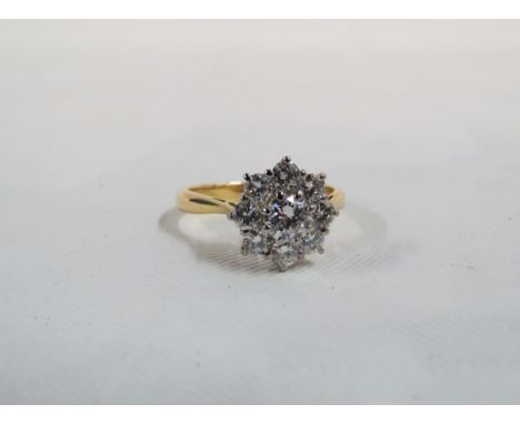 18CT GOLD 9 STONE DIAMOND CLUSTER RING WITH 1 CARAT OF DIAMONDS COLOUR G, CARITY VVS 1