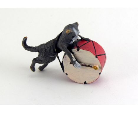 Cold painted bronze of a cat playing a drum