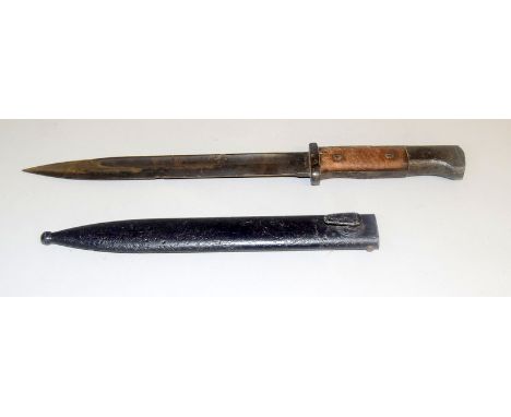 A Third Reich knife bayonet in its steel scabbard 25.5cms blade length