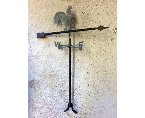 Wrought iron weather vane depicting chickens