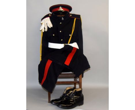 A Royal Horse Artillery No.1 Dress Uniform of Tunic, Trousers, Cap, Parade Belt & Scabbard, Lanyard, Gloves and Boots