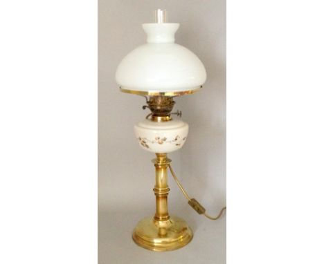 China based Oil lamp with white shade converted to electricity 70cm high