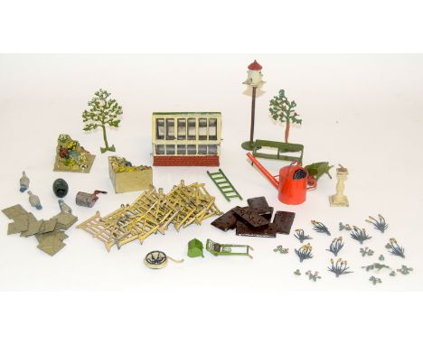 Pre war Brittons die cast metal  figures 'Green House Floral Gardens' to include flowers ,garden tools Paving slabs etc