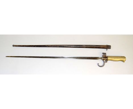 A French model 1886 Epee bayonet with aluminium hilt in its steel scabbard. Blade length 52cms
