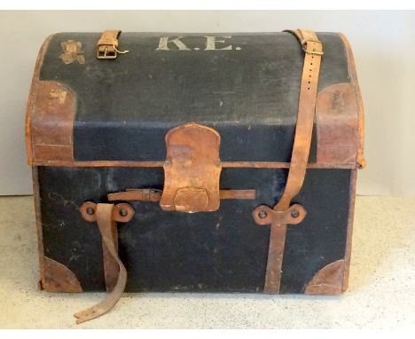 Leather bound travelling trunk with dome top and support straps ,internal fitment with removable tray compartment ,60x80x60cm