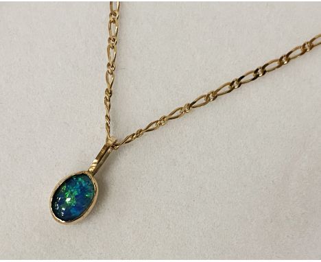 BLACK OPAL ON A 9CT GOLD ANKLE CHAIN