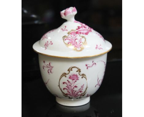 A Worcester porcelain sucrier, circa 1780, with flower head finial to lid, pink floral designs and gilding, height 13.5cm. Co