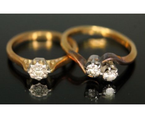 A hallmarked 18ct gold diamond ring and another two stone diamond crossover ring marked '18ct', gross wt. 6.02g, size K &amp;