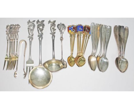 Assorted Swedish silver comprising three with Art Nouveau finials, a set of six pickle forks with floral finials, two sets of
