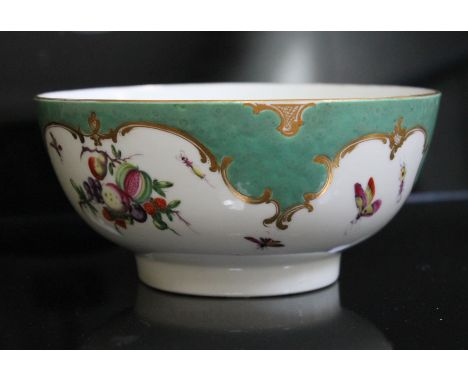 A Worcester porcelain slop bowl, circa 1770, decorated in Spotted Fruit pattern, bearing Meissen crossed swords in under glaz