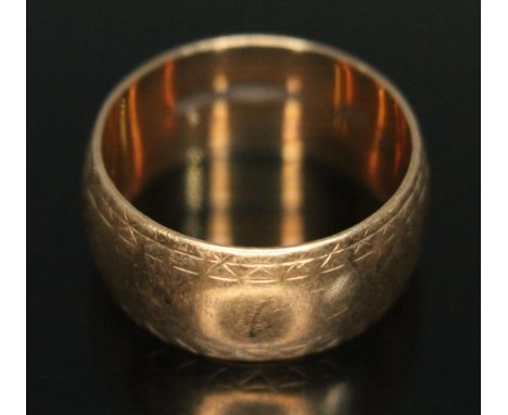 A hallmarked 9ct gold wedding band, wt. 5.21g, size M.  Condition - good, general wear only.