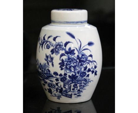 A Worcester porcelain tea caddy, circa 1765, of barrel form and decorated in Fence pattern, with cover, crescent mark to base