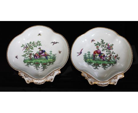 A pair of Worcester porcelain dishes, circa 1770, of shell shape and each with hand painted decoration to interiors depicting