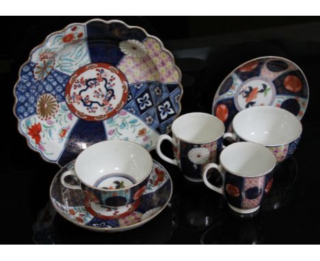A group of Worcester Japan pattern porcelain, circa 1770, comprising a coffee cup and saucer with crescent mark and a matchin