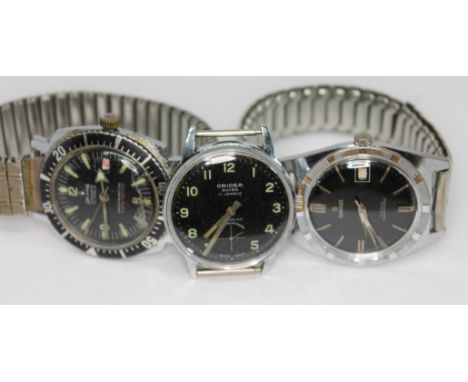 Three vintage chrome plated black dial manual wind mechanical wristwatches comprising a Waldman Submarine 21 jewel with date,
