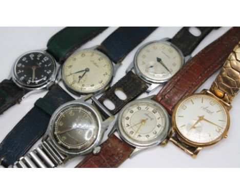 A collection of six vintage manual wind mechanical wristwatches comprising a Paul Buhre and a Garrard nickel plated wristwatc