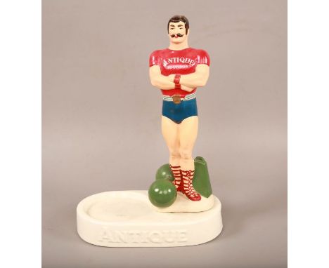 Vintage bottle jockey / bottle  display  for "Antique Bourbon" whiskey  with Muscle man, Ceramic.30x21cmReserve: £50#1880
