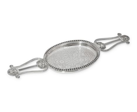 A Scottish George IV Silver Lyre Form Lemon Strainer&nbsp;Robert Gray and Son, Glasgow, 1820hallmarked for Sterling in strain