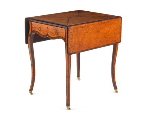 A George III Mahogany, Padouk and Amboyna Pembroke TableCirca 1775opening to a fitted mahogany-lined interior.Height 28 1/2 x