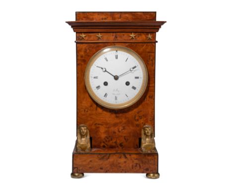 An Empire Burr Elm and Ormolu-Mounted Mantel ClockCirca 1810the dial signed Le Roy, Palais Royal.Height 14 1/2 x width 7 1/2 