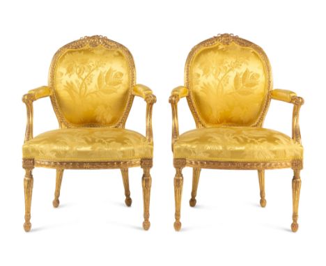 A Pair of George III Carved Giltwood ArmchairsAttributed to Thomas Chippendale, Circa 1775Height 37 1/4 x width 26 5/8 inches