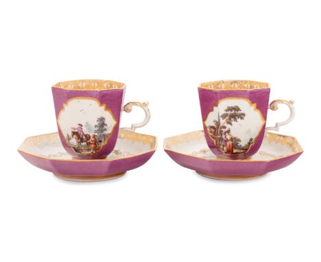 A Pair of Meissen Magenta-Ground Scenic Porcelain Teacups and Saucers&nbsp;Circa 1740each bearing crossed swords in underglaz