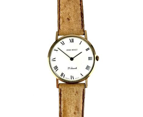 A Jean Renet 9ct gold gentleman's manual wind dress watch. The signed circular white 30mm dial with Roman numerals, 21 jewel 