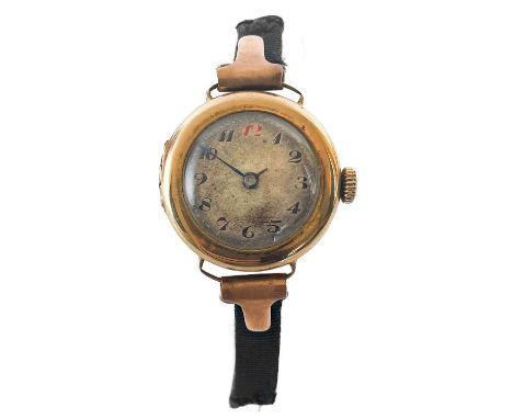 An early 20th century 9ct rose gold lady's manual wind wrist watch. The 18mm silvered dial with Arabic numerals, the 15 jewel