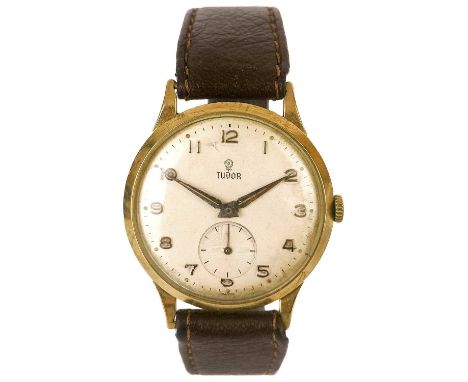 A Tudor 9ct gold cased 1960's manual wind gentleman's wristwatch. The signed 28mm silver dial with gilt Arabic numerals and s