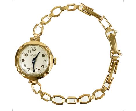 A 9ct gold lady's manual wind bracelet wristwatch.  The 18mm silvered dial signed Lanco, 15 jewel movement, on a 9ct 'metal c