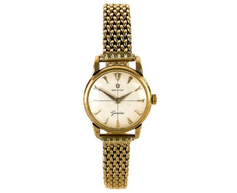 A 1950's 9ct Omega lady's manual wind bracelet wristwatch. Cal. 244, the signed silver 18mm dial with gilt baton markers, the