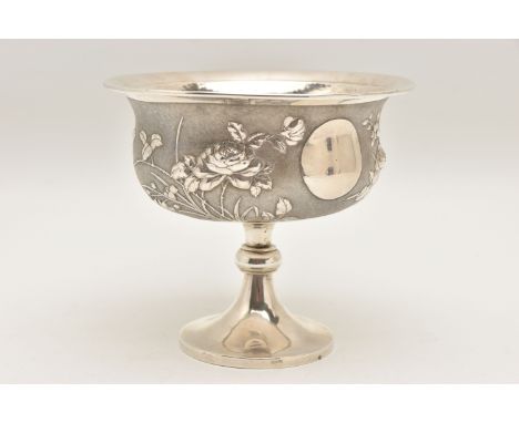 AN EARLY 20TH CENTURY CHINESE SILVER PEDESTAL BOWL, embossed with a floral pattern on a textured background, vacant circular 