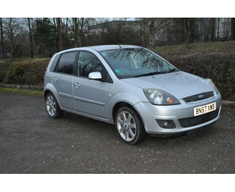 A 2007 FORD FIESTA ZETEC CLIMATE FIVE DOOR HATCHBACK CAR, in silver with a 1242cc petrol engine, five speed manual gearbox, e