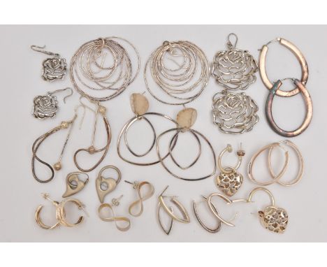 AN ASSORTMENT OF SILVER AND WHITE METAL EARRINGS, to include a pair of open work floral silver earrings, hallmarked Birmingha