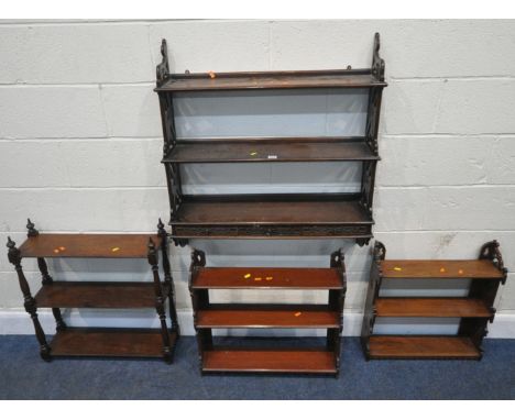 A REPRODUCTION THREE TIER CHIPPENDALE STYLE WALL HANGING SHELF, with three drawers, and blind fretwork details, width 83cm x 