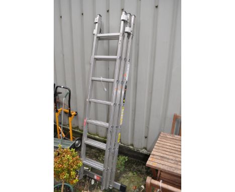 A YOUNGMAN COMBI 200 TRIPLE ALUMINIUM EXTENSION LADDER, with seven rungs to each length, overall 2.0m, condition report: pain